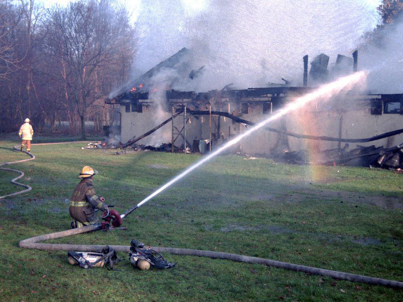 Firefighters Fighting House Fire